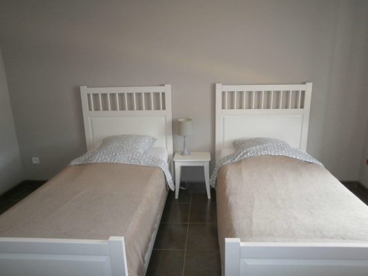 twee eenpersoonsbedden